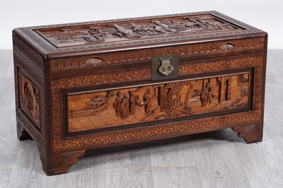 Lot 23 - A 20th Century oriental carved camphor wood chest