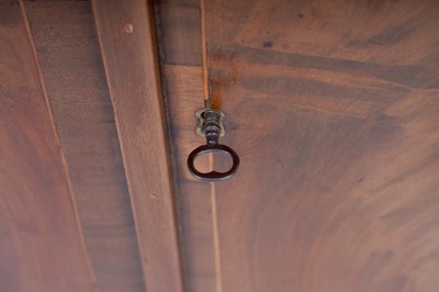 Lot 42 - An Edwardian revolving bookcase; and a Georgian inlaid mahogany corner cabinet