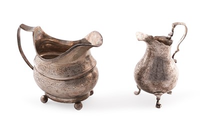 Lot 456 - A Georgian silver milk jug; and a Victorian silver cream jug