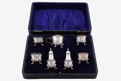 Lot 425 - A six piece silver cruet set