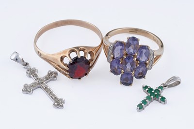 Lot 346 - Two crucifix pendants; and two rings