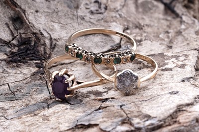 Lot 16 - Three gemstone rings, including: an early 20th Century diamond flowerhead pattern ring on 18ct gold