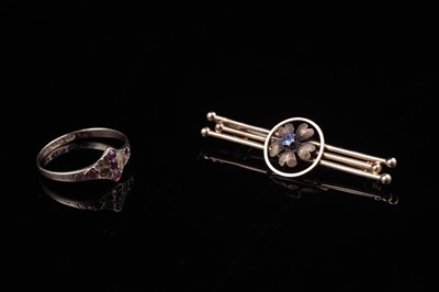 Lot 23 - A Victorian sapphire bar brooch, and a Victorian ruby and seed pearl ring