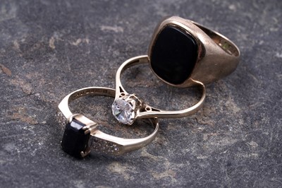Lot 25 - Three modern rings, including sapphire and diamond