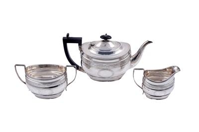 Lot 136 - A George V silver three-piece tea set