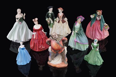 Lot 234 - Eight ceramic figures, including four Royal Doulton