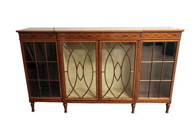 Lot 608 - An Edwardian inlaid mahogany and satinwood banded breakfront bookcase