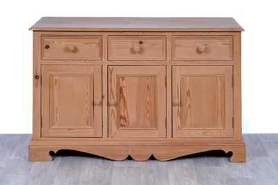 Lot 15 - A 20th Century stripped pine sideboard