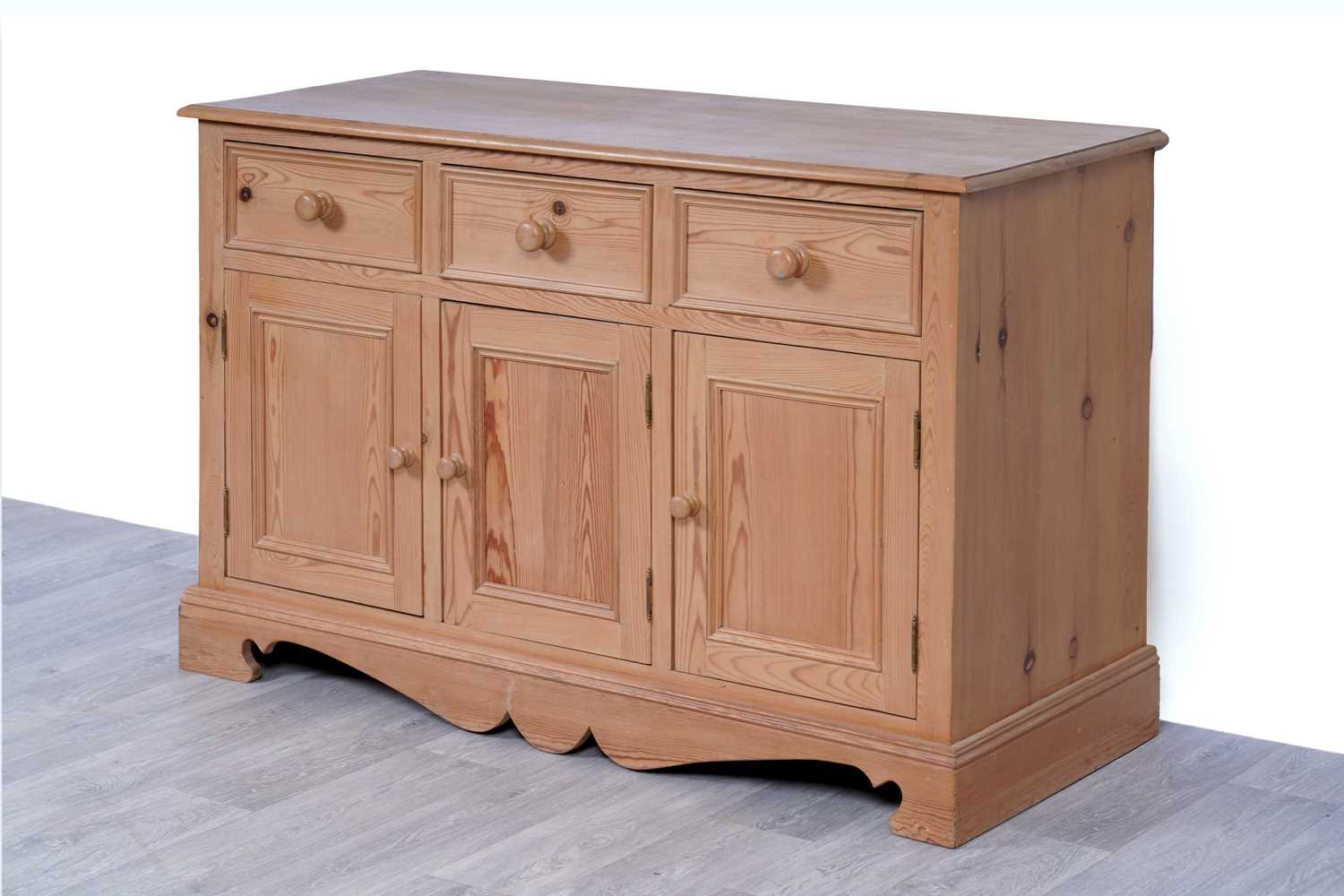 Lot 15 - A 20th Century stripped pine sideboard