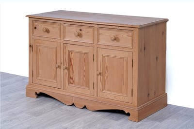 Lot 15 - A 20th Century stripped pine sideboard