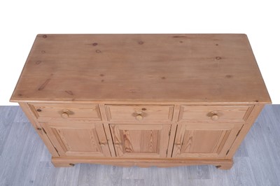 Lot 15 - A 20th Century stripped pine sideboard