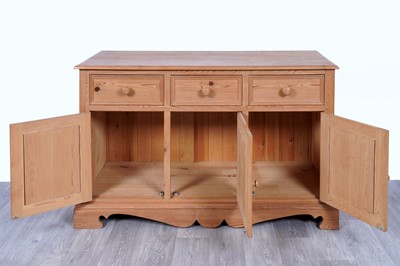 Lot 15 - A 20th Century stripped pine sideboard