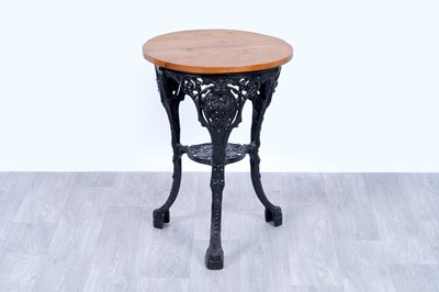 Lot 16 - A cast metal pub table