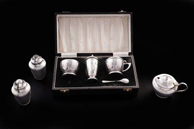 Lot 424 - Two silver condiment sets