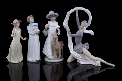 Lot 273 - A collection of four Nao ceramic figures
