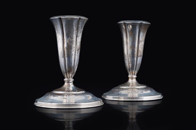 Lot 298 - A pair of early 20th Century American silver candlesticks