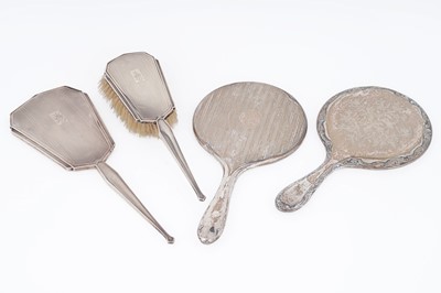 Lot 416 - Early 20th Century silver hand mirrors; and a hairbrush