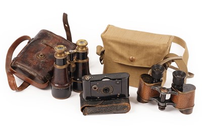 Lot 188 - Two pairs of military binoculars; and a Kodak vest pocket camera