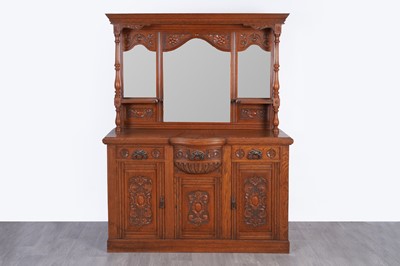 Lot 26 - An Edwardian oak mirror back sideboard