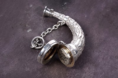 Lot 36 - A Victorian silver horn-shaped vinaigrette and scent bottle combined, London 1874