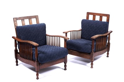Lot 630 - Wylie & Lockhead: a pair of Arts and Crafts period oak reclining armchairs