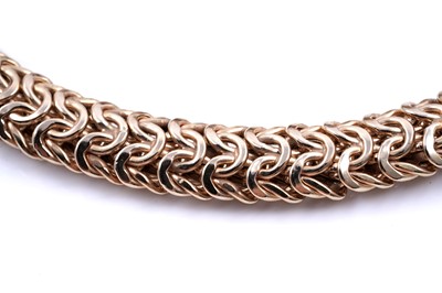 Lot 165 - A contemporary 9ct gold woven necklace