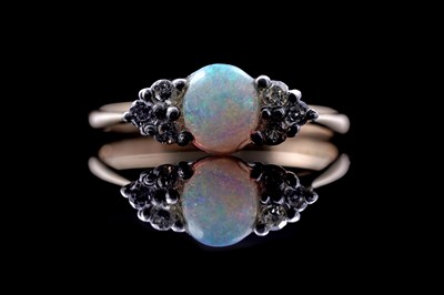 Lot 169 - An Edwardian Revival opal and diamond ring
