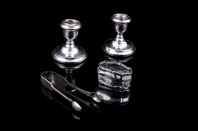 Lot 267 - 20th Century silver, including: candlestick holders and bud vases