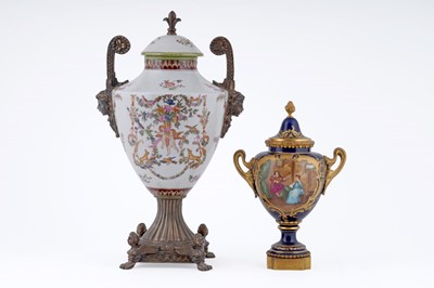 Lot 265 - A late 19th/early 20th Century Sevres style twin handled vase; and a reproduction twin handled vase