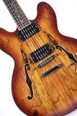 Lot 136 - A Quincy 335 style guitar
