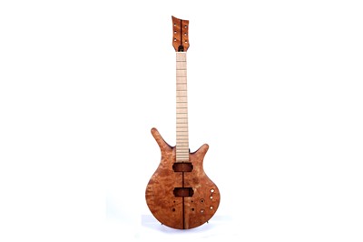 Lot 252 - An unfinished guitar body and neck