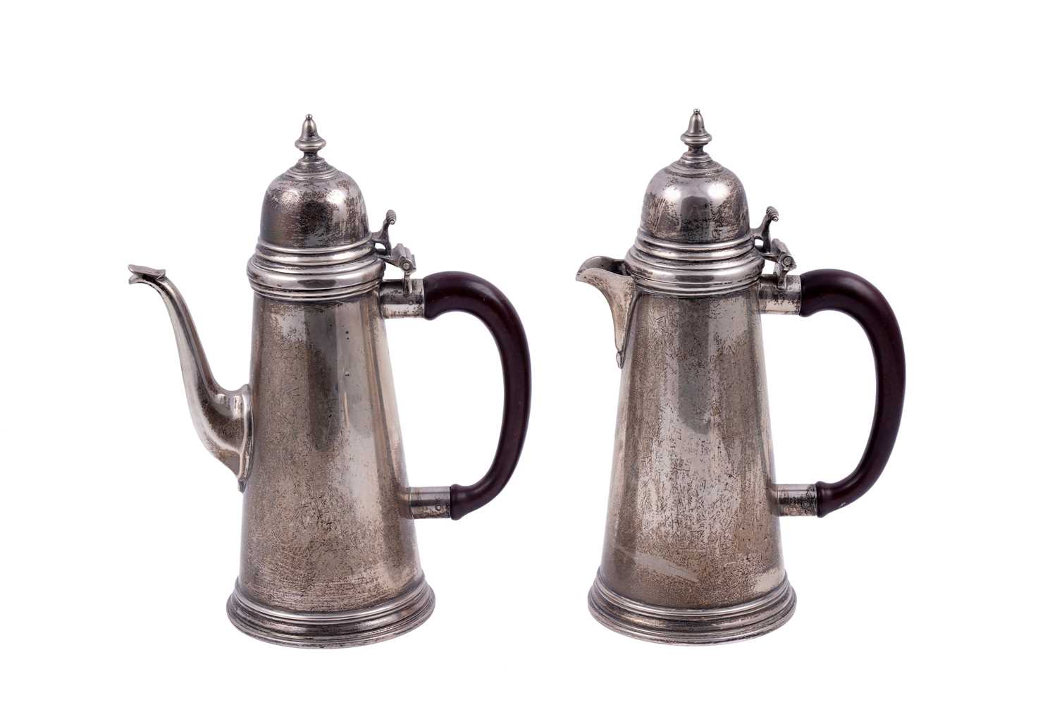 Lot 139 - A pair of Elizabeth II silver café au lait pots, London 1973