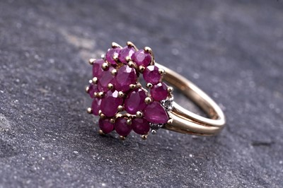 Lot 177 - A contemporary ruby and diamond ring