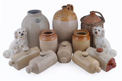 Lot 219 - A collection of stoneware flagons, jars, and hot water bottles