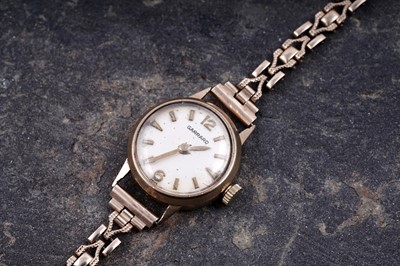 Lot 224 - A lady's 9ct gold Garrard watch