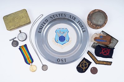 Lot 388 - A Christman 1914 tin containing a pair of World War I medals; and other items