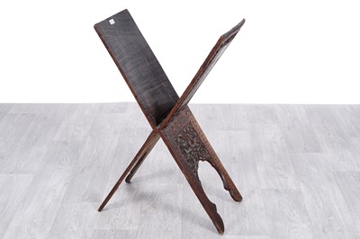 Lot 51 - A late 19th Century Anglo-Indian inlaid brass carved hardwood Quran stand