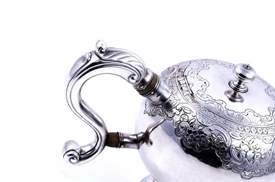 Lot 362 - A George II Scottish silver bullet teapot