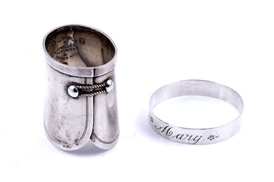 Lot 447 - An Australian silver napkin ring; and a curious Australian silver article
