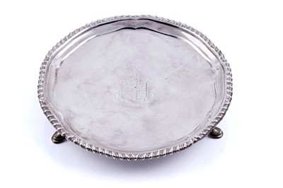 Lot 458 - An early George III silver waiter of shaped circular outline
