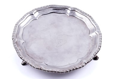 Lot 459 - A George III silver waiter of shaped circular outline