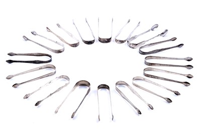 Lot 477 - Sixteen pairs of sugar tongs, by Bateman family, including Hester Bateman
