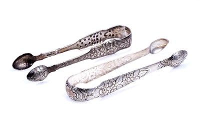 Lot 518 - A pair of William IV Irish silver sugar tongs