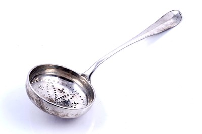 Lot 534 - A George II Scottish silver strainer ladle