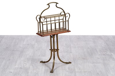 Lot 61 - An Edwardian brass and oak two-division magazine rack