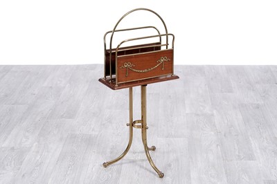 Lot 62 - A late Victorian brass and mahogany two-division magazine rack