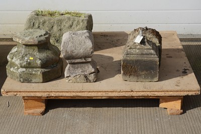 Lot 320 - A rough-hewn sandstone trough/planter; and a collection of sandstone architectural elements