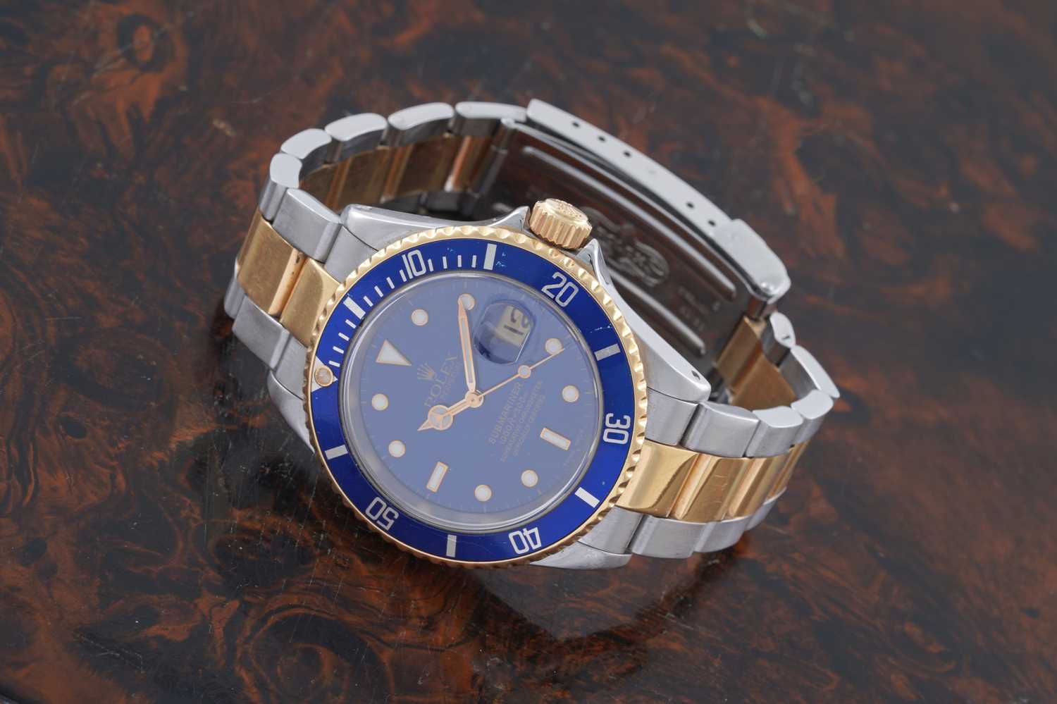 Lot 607 - Rolex Oyster Perpetual Submariner: a bi-metal chronometer wristwatch
