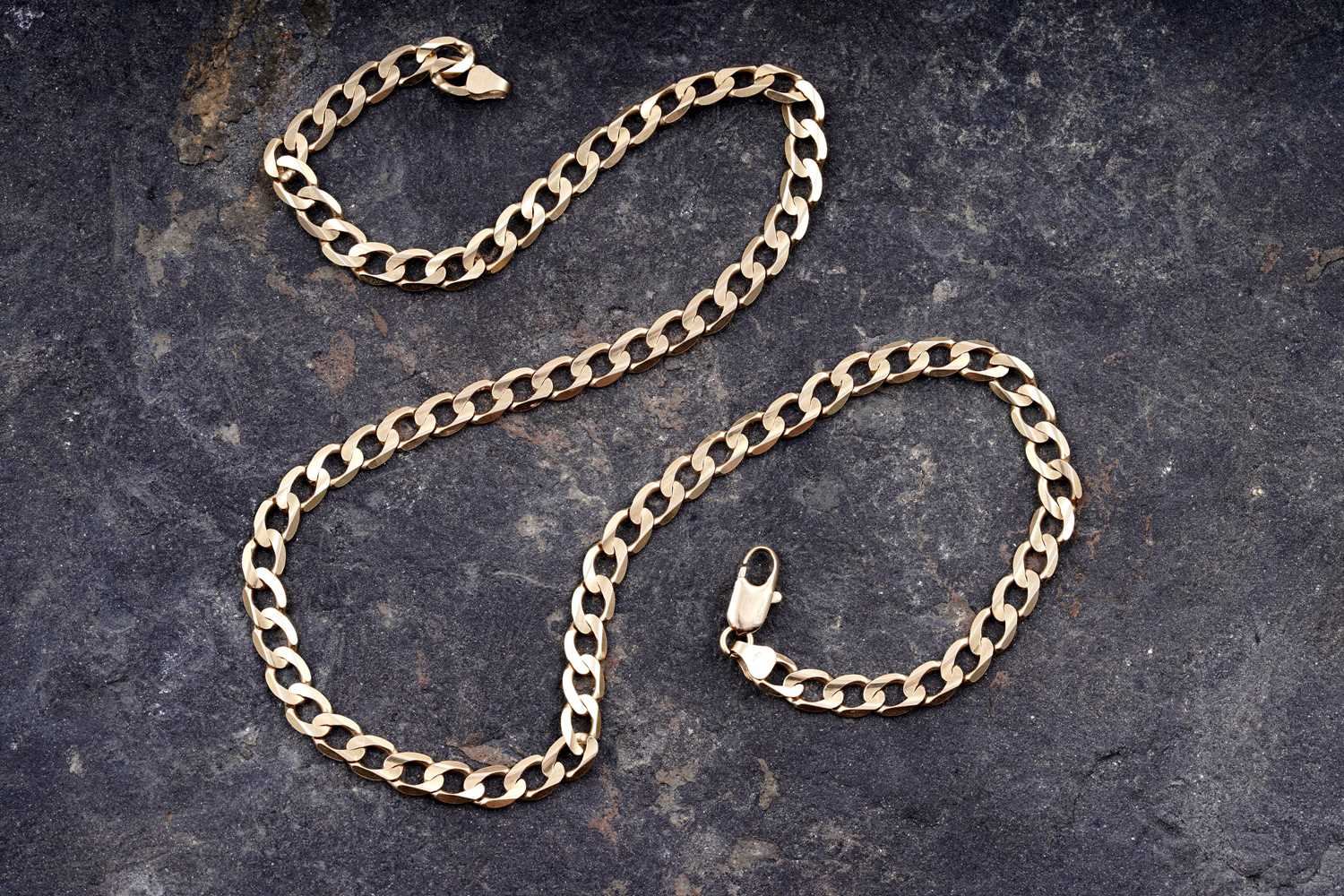 Lot 92 - A modern 18ct gold flat curb-link necklace