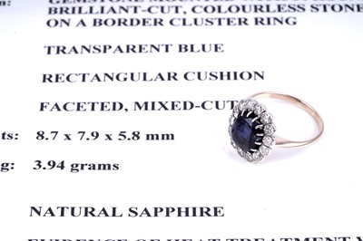 Lot 478 - A sapphire and diamond cluster ring